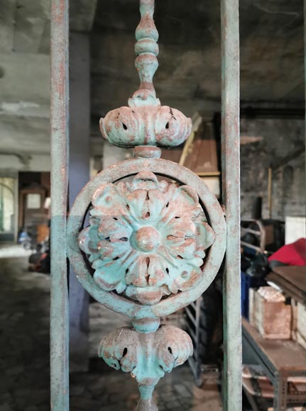 Old wrought iron entrance door of a Napoleon III period mansion.-9