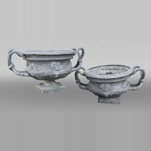 Pair of lead vases after the Warwick Vase