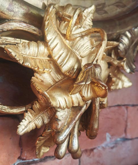 Oval gilt mirror in the Napoleon III style, featuring rich foliate ornamentation Oval gilt mirror in the Napoleon III style, featuring rich foliate ornamentation-10