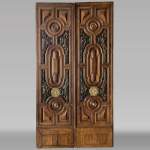 Exterior double door of sculpted oak