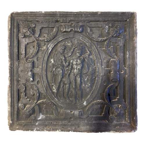 Cast iron fireback from the Renaissance period adorned with a medallion