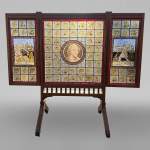 JOHN MOYR SMITH FOR COX & SONS (attributed to), A rare and exceptional stained glass fire screen, circa 1875