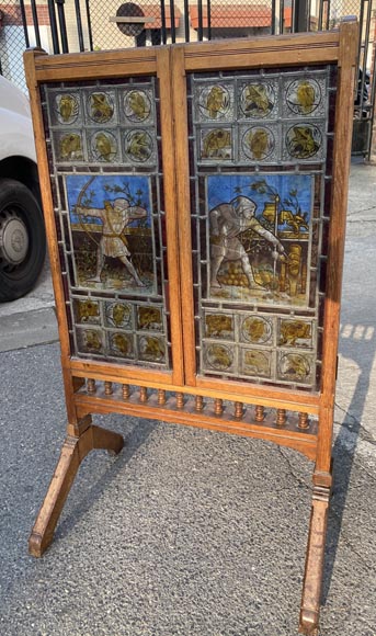 JOHN MOYR SMITH FOR COX & SONS (attributed to), A rare and exceptional stained glass fire screen, circa 1875-8
