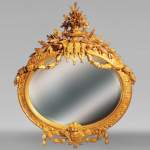 Mirror with an abundant Louis XVI decoration with garlands and branches