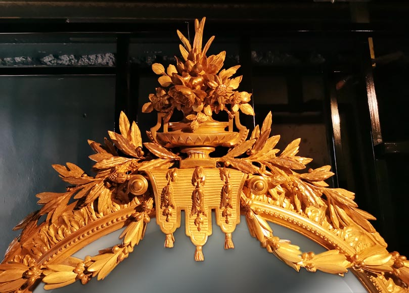 Mirror with an abundant Louis XVI decoration with garlands and branches-1