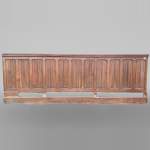 Elements of paneled room and foundations in oak with napkin fold decoration