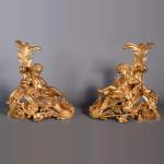 Paire of Napoleon III andirons in gilt bronze depicting Venus and Bacchus as children