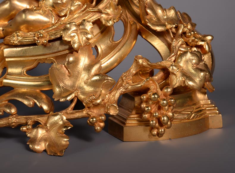 Paire of Napoleon III andirons in gilt bronze depicting Venus and Bacchus as children-6