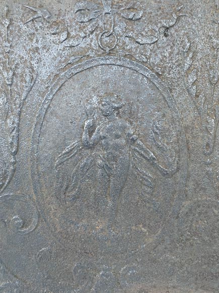 Cast iron fireback depicting Venus in a medallion-1