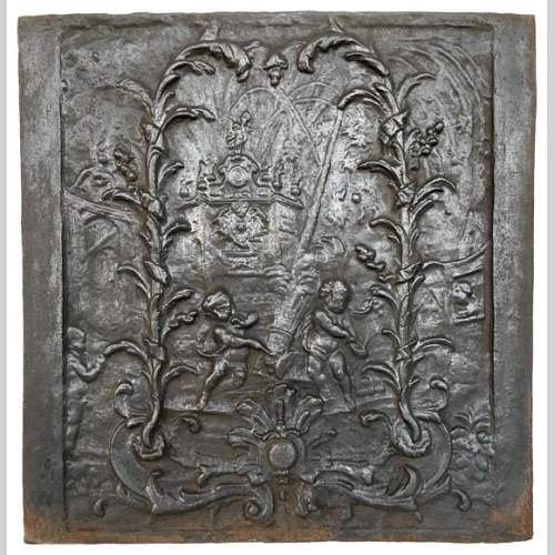 Antique fireback décorated with putti and a cannon, 19th century