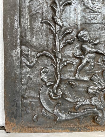 Antique fireback décorated with putti and a cannon, 19th century-4