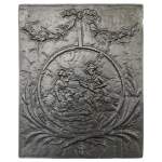 Fireback adorned with a romantic scene in a medallion