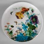 Théodore DECK, Round plate with flowers and butterflies decorations, circa 1880-1890