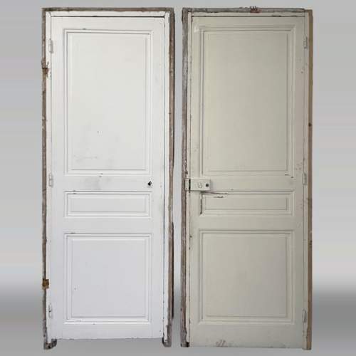 Pair of antique molded doors with frames