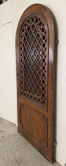 Oak entrance door with open decoration and curved top-2