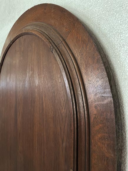Oak entrance door with open decoration and curved top-11