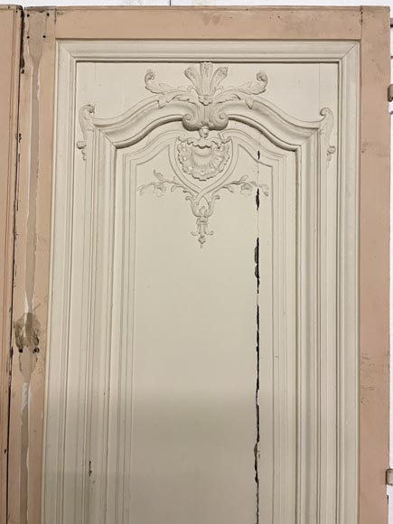 Beautiful sculpted wood double door with a monogram-4