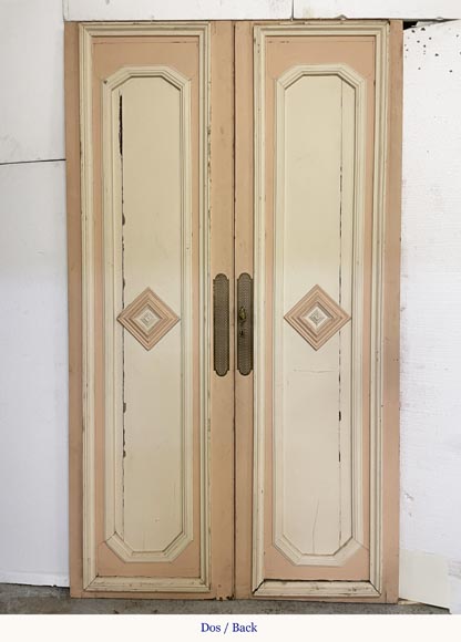 Beautiful sculpted wood double door with a monogram-8