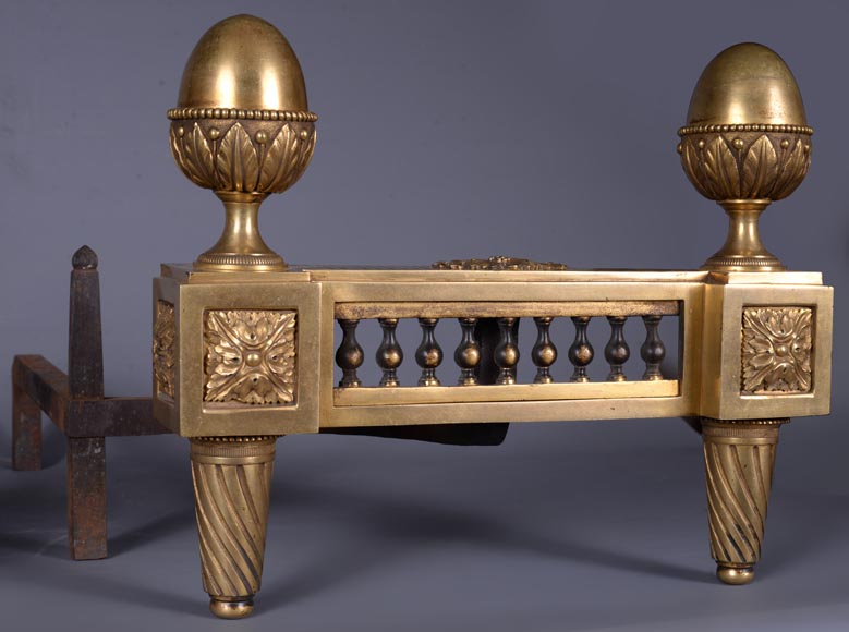 Bouhon: Pair of Louis XVI style firedogs in gilt bronze with stylized pine cones-2