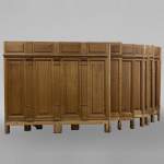Series of about 10 linear meters of paneled room's bases in oak with Ionic capitals