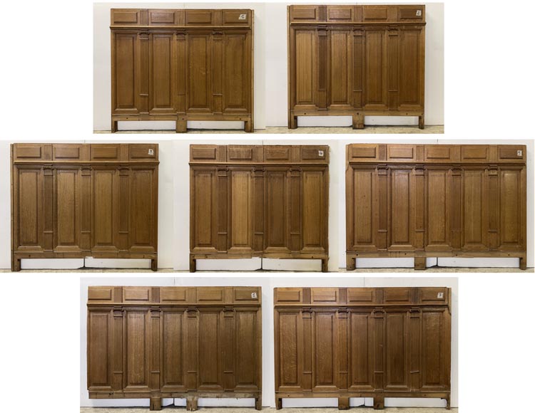 Series of about 10 linear meters of paneled room's bases in oak with Ionic capitals-4