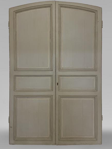 Double paneled door in wood with curved top-0