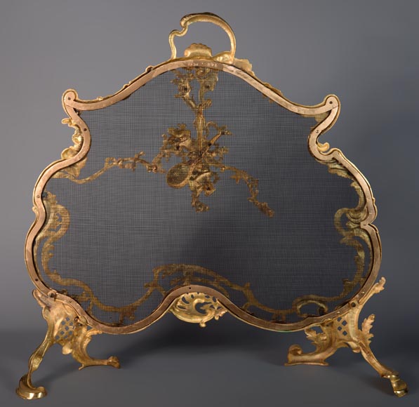 Louis XV style gilt bronze sparkler with musical instruments-8