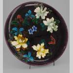 Théodore DECK, Round plate with flowers and butterfliy decorations