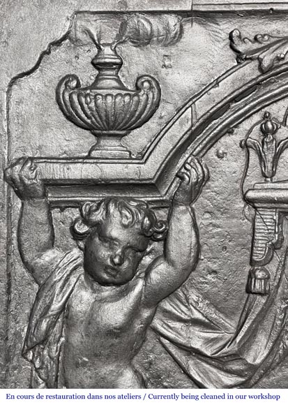 18th-century fireplace plaque with a salamander and two atlantes supporting an entablature with fire vases-2