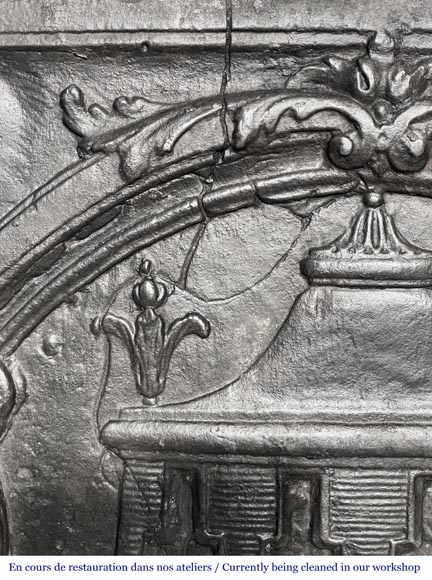 18th-century fireplace plaque with a salamander and two atlantes supporting an entablature with fire vases-5