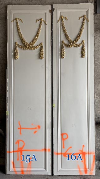 Carved, regilded and white-painted wooden paneling-12