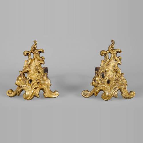 Small pair of Rococo firedogs in bronze polished varnished