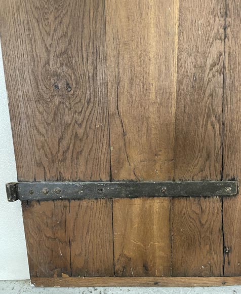 Series of three antique oak doors with their metal hinge-5