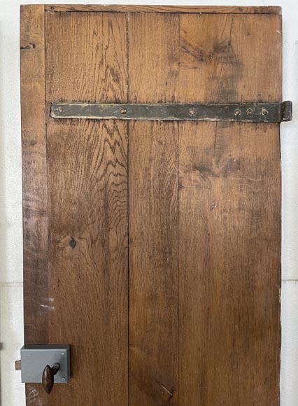 Series of three antique oak doors with their metal hinge-6