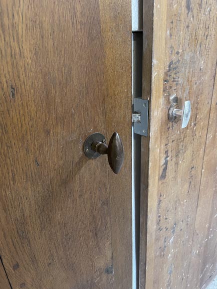 Series of three antique oak doors with their metal hinge-14