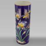 Manufacture de Longwy - Vase with an enameled decoration of iris and insects on a Sèvres blue background, circa 1890