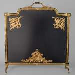 Gilded bronze firescreen with angel decoration