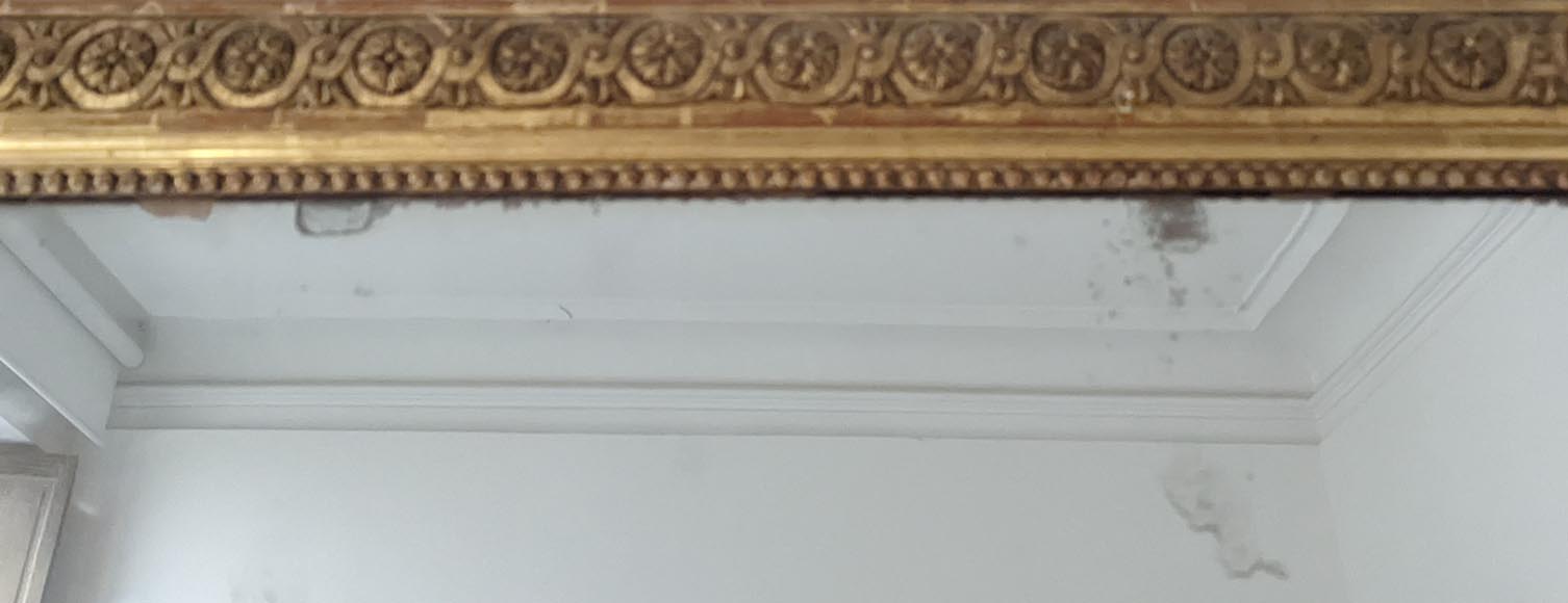 Large gilded Louis XVI style overmantel with rosette motif-1