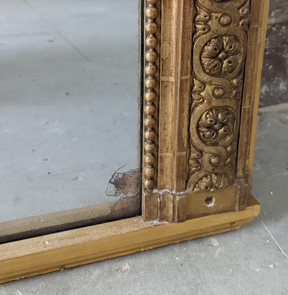 Large gilded Louis XVI style overmantel with rosette motif-8
