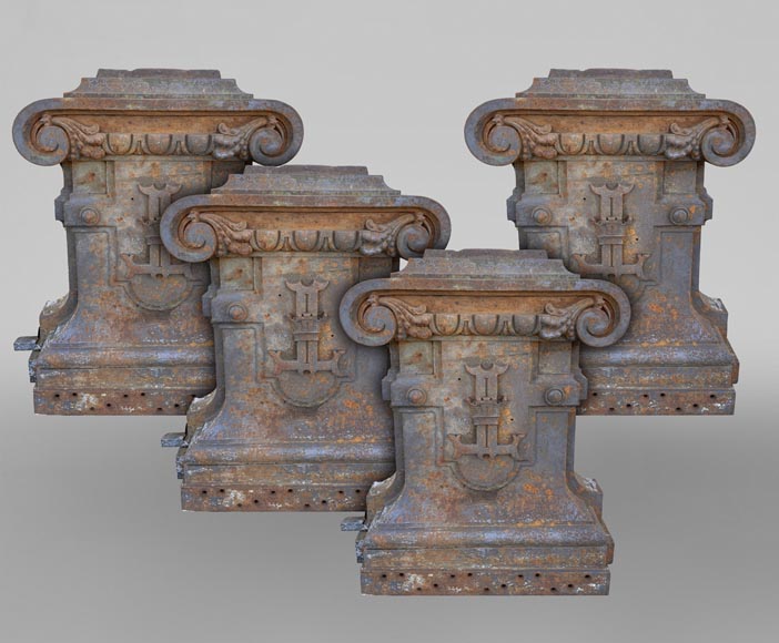 Four cast-iron pilaster bases adorned with a coat of arms-0