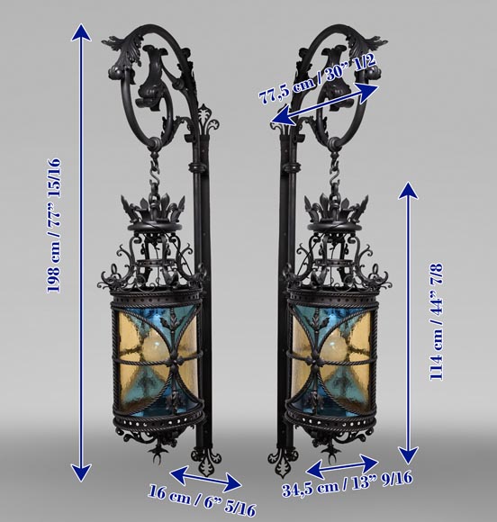 Pair of neo-Gothic lanterns with fleur-de-lis and dolphins, circa