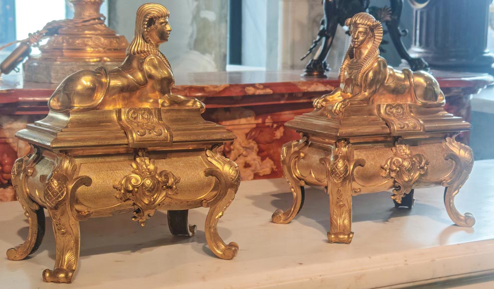Pair of Napoleon III style gilt-bronze chenets featuring sphinxes-2