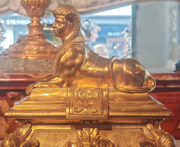 Pair of Napoleon III style gilt-bronze chenets featuring sphinxes-4