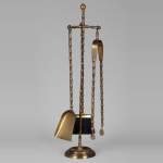 Modern brass mantelpiece tool set