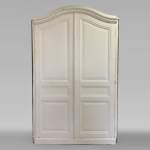 Double curved cupboard door with frame