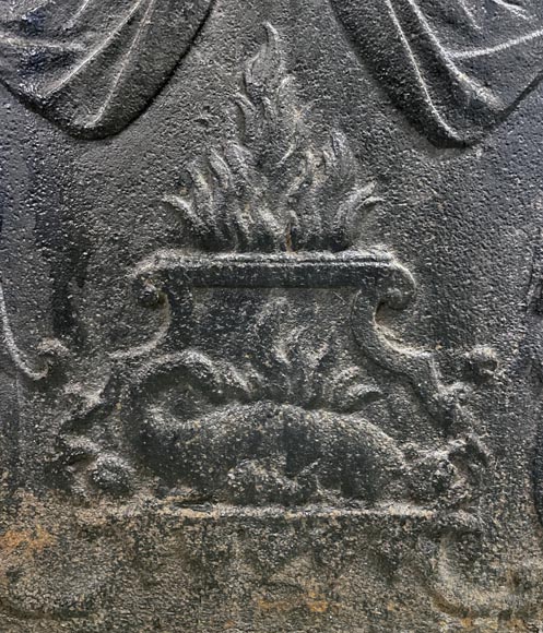 Fireback of the 18th century with two atlantes supporting an entablature with fire vases-3