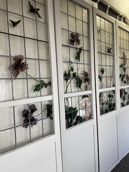 Quadruple sliding door with stained glass windows featuring birds and plants-4
