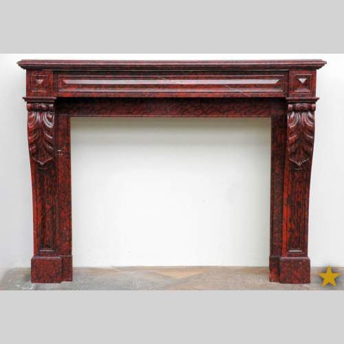 Red Griotte marble mantel with leaf modillions