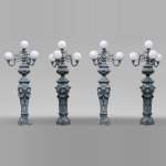 Four cast iron lamp posts of the Val d'Osne with four lights