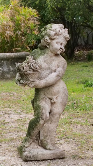 Sculpture of a putto with a flowering basket in Firenze stone-1